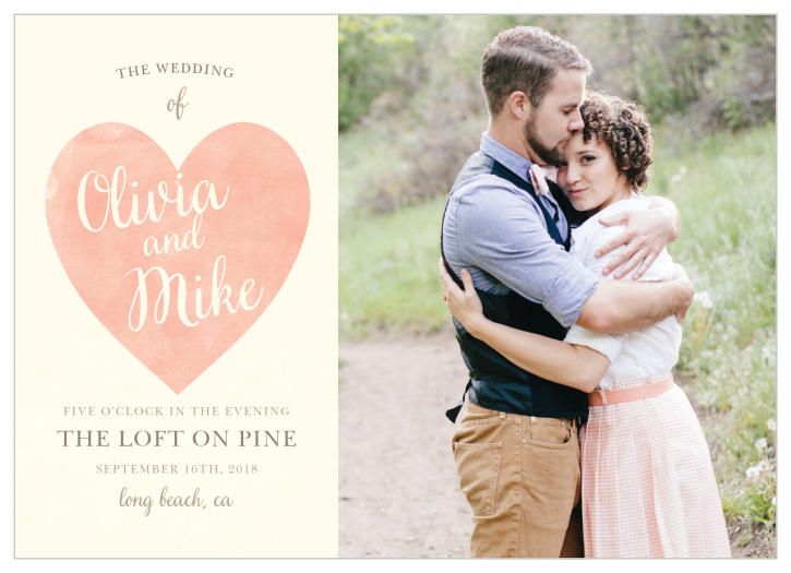 Invite your loved ones to your wedding with cards as beautiful as your day itself: our Simply in Love Wedding Invitations prominently display your favorite engagement photo alongside faded red heart, which bears your names in a cream cursive the same color as the background.